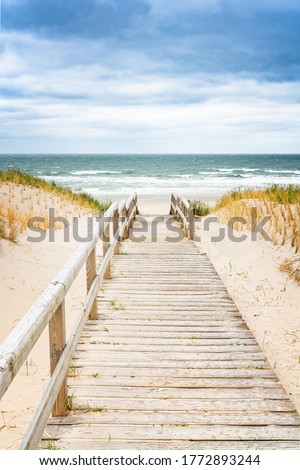 Similar – Foto Bild Strandeingang mit Blick auf das Meer