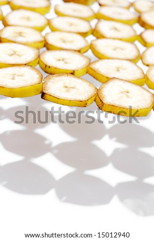 Sliced banana isolated on white background.