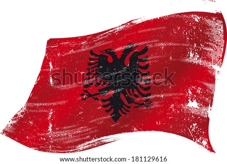 flag of  Albania in the wind with a texture