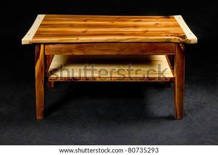 wooden night table - piece of furniture in front of black background
