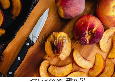 Image, Stock Photo Sliced fresh peach and grape on homemade ceramic plate on yellow tablecloth,