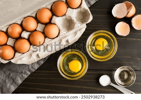 Similar – Image, Stock Photo organic eggs in egg box on white marble kitchen table