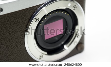 Closeup shot of camera image sensor (CCD or Cmos) for compact, APS-C, SLR or DSLR point and shoot camera. Isolated on white background. Copy space.