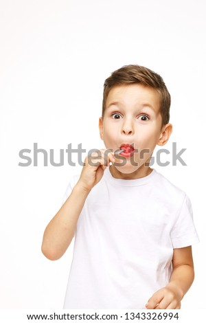 Similar – Image, Stock Photo Child with lollipop