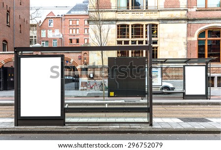 Blank billboard on a bus stop in european town