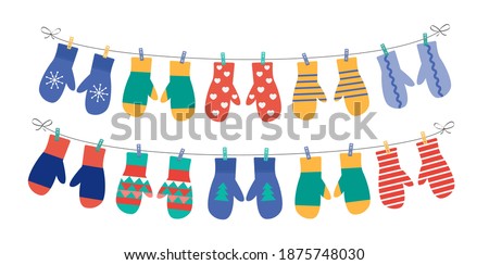 Different mittens hanging on the rope, set, vector illustration. 