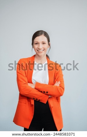 Similar – Image, Stock Photo portrait of a young beautiful woman wearing casual clothes, standing on a mountain of green wood blocks background and smiling. Outdoors lifestyle.