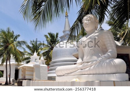 Buddhist Stupa under palm trees on Nainativu island near Jaffna in Indian Ocean, Sri Lanka, erected by Sri Lankan army after capitulation of Tamil Tigers