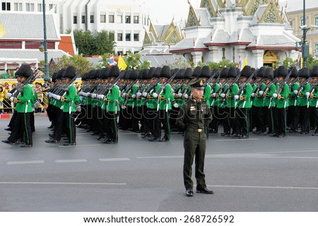 Bangkok, Thailand - 2 December 2014: Soldiers perform the marching of the colors military parade, showcasing Thailand\'s strength to celebrate the 87th birthday of His Majesty King Bhumibol Adulyadej