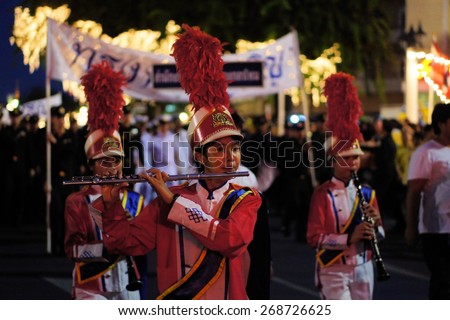 Bangkok, Thailand - 5 December 2014: Soldiers play music at a military parade to celebrate the 87th birthday of His Majesty King Bhumibol Adulyadej at the royal field Sanam Luang adjoining the Grand