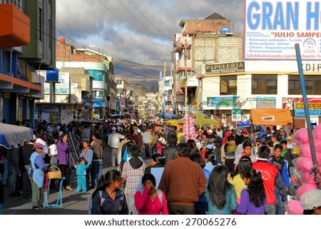 Latacunga, Ecuador 30 September, 2012: Downtown Latacunga is very crowded during La Fiesta de la Mama Negra traditional festival.  Mama Negra Festival is a mixture of indigenous, Spanish and African