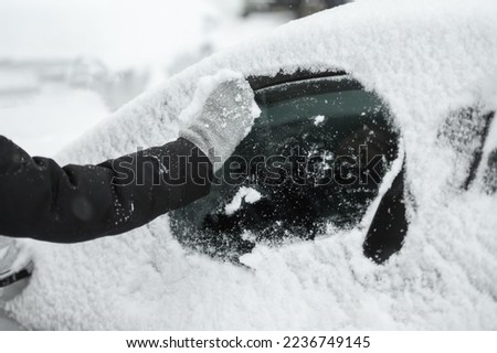 Similar – Image, Stock Photo Woman in heavy snowfall in the park