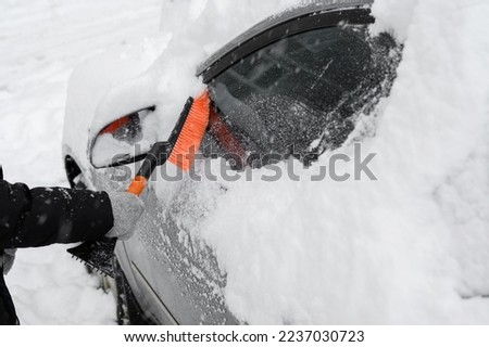 Similar – Image, Stock Photo Woman in heavy snowfall in the park