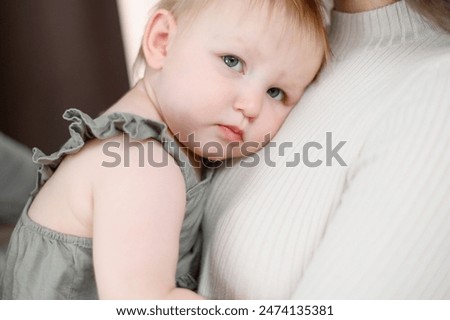 Similar – Image, Stock Photo Sad girl portrait clinging to a gate