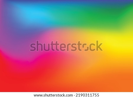 Abstract blurred gradient mesh background in bright rainbow colors