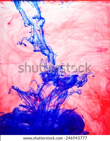 Colored ink in water. Abstract color ink in aqueous solution.