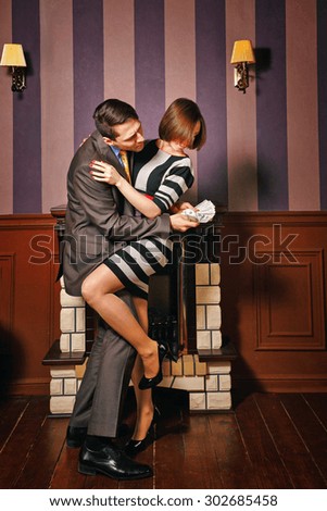 Businessman does not want to share profits with his wife. Vintage interior. The concept of running a successful business. The difficulties of conducting family business.