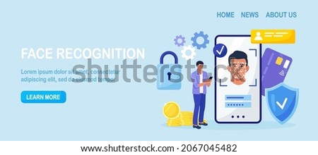 Face recognition and data safety. Man getting access to data after biometrical checking. Person holds phone and scans the  face with mobile application. Biometric identification, face ID system