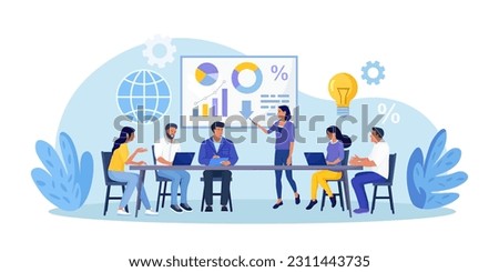 Business Training, Coaching and Education. Mentor Presenting Charts, Diagrams and Reports before Audience. Coach Speaking before Business People at Conference, Lecture. Employees Meeting at Seminar