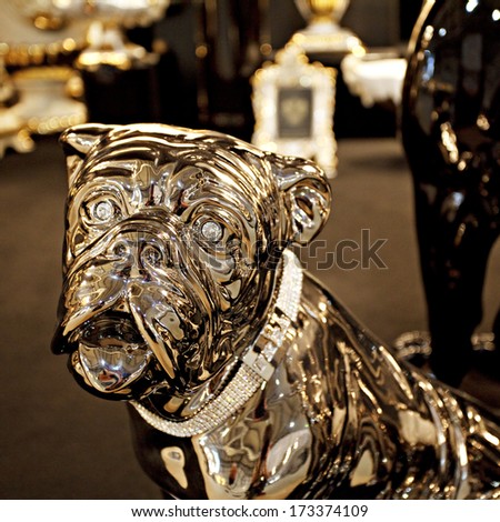 MILAN, ITALY - JANUARY 20, 2014: dog made of shiny metal at HOMI,the new big MACEF, home international show in the sector of interior design on JANUARY 20, 2014 in Milan.