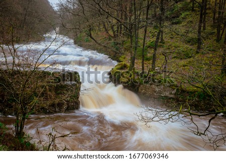 Sgwd y Bedol, the Horseshoe Falls, after heavy rain on the River Neath in waterfall country in the Brecon Beacons - beautiful long exposure Stok fotoğraf © 