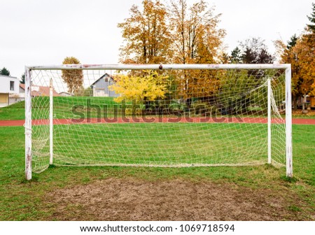 Similar – Image, Stock Photo old soccer goal sports equipment on the field