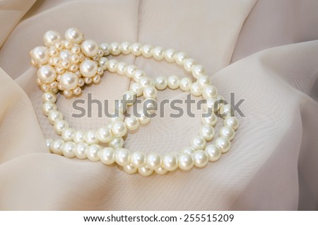 vintage brooch and pearls