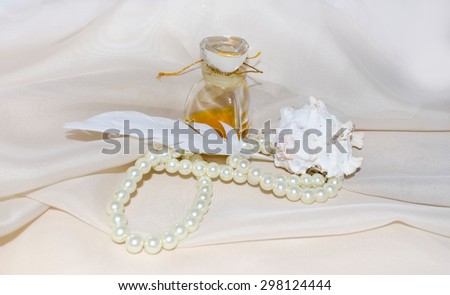 Vintage Perfume Bottle with feather, pearls and shellfish