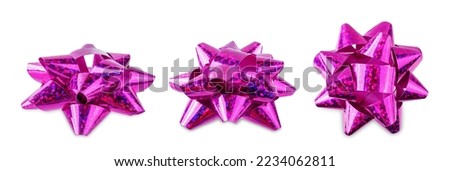 Similar – Image, Stock Photo knotted multi-colored ribbon bows