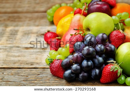 fruits. mango, lemon, plum, grape, pear, orange, Apple, banana, strawberry. the toning. selective focus