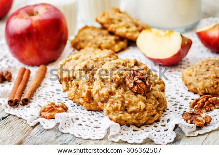apples oats cinnamon cookies on a white wood background. the toning. selective focus