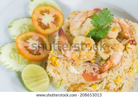 Thai Fried rice  with shrimp, egg, white onions, green onions, tomatoes, cilantro and cucumber with lime on the side