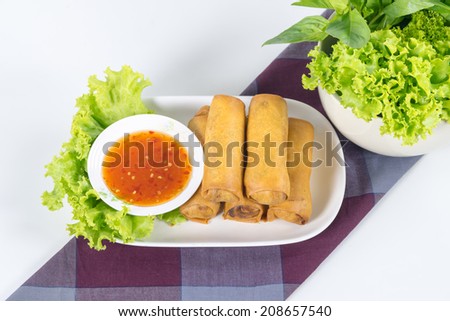 Fried Vegetable egg roll, spring roll, cabbage, silver noodles, carrots, celery, mushrooms, taros, thai sweet sauce