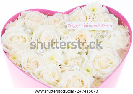 White roses and pearl and diamond held in the heart shape box with \
