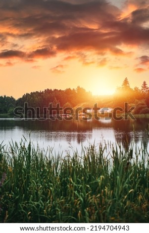 Similar – Image, Stock Photo Dramatic sunset over a pristine landscape with an approaching storm from the north over part of Beskydy mountains, czech republic