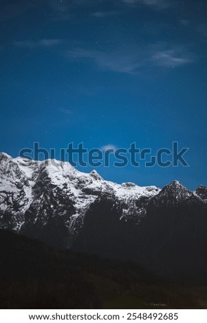 Similar – Image, Stock Photo Dark mountain range under cloudy sky in twilight