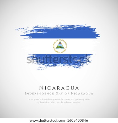 Nicaragua flag made in brush stroke background. Independence day of Nicaragua. Creative Nicaragua national country flag icon. Abstract painted grunge style brush flag background.