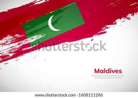 Maldives flag made in brush stroke background. National day of Maldives. Creative Maldives national country flag icon. Abstract painted grunge style brush flag background.