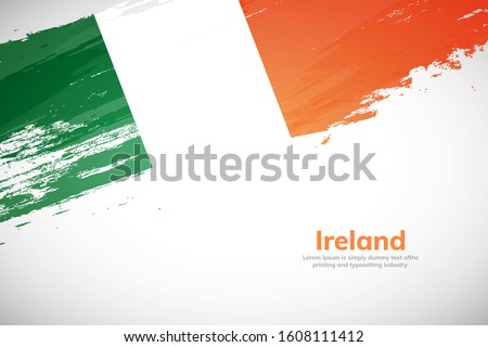 Ireland flag made in brush stroke background. National day of Ireland. Creative Ireland national country flag icon. Abstract painted grunge style brush flag background.
