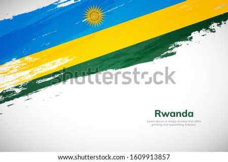 Rwanda flag made in brush stroke background. National day of Rwanda. Creative Rwanda national country flag icon. Abstract painted grunge style brush flag background.