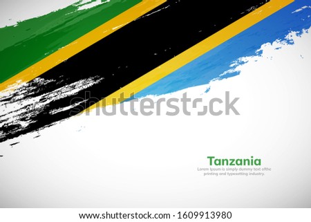 Brush painted grunge flag of Tanzania country. Hand drawn flag style of Tanzania. Creative brush stroke abstract concept brush flag background.