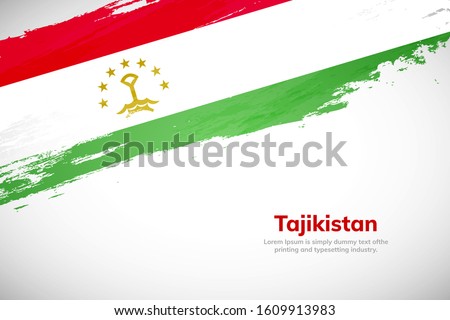 Tajikistan flag made in brush stroke background. National day of Tajikistan. Creative Tajikistan national country flag icon. Abstract painted grunge style brush flag background.