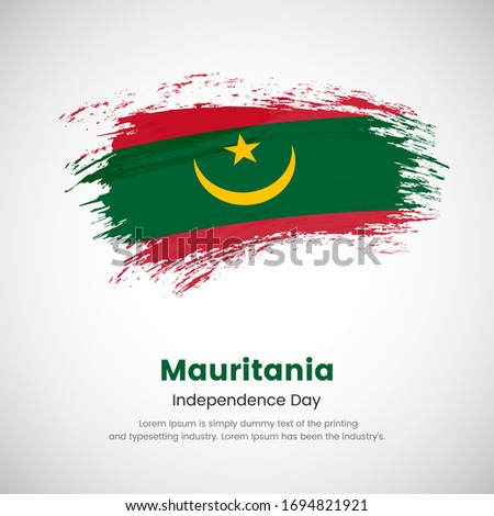 Brush painted grunge flag of Mauritania country. Independence day of Mauritania. Abstract creative painted grunge brush flag background.