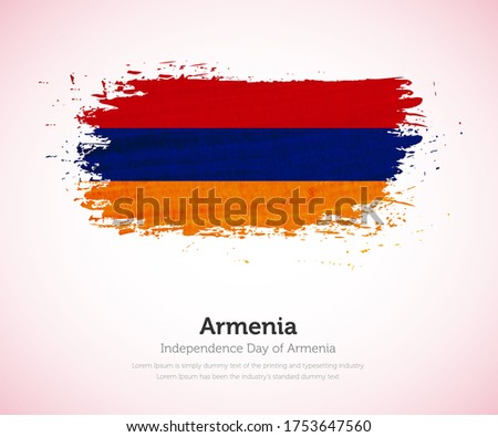 Independence day of Armenia country. Abstract flag in shape of paint brush stroke with shiny colored background