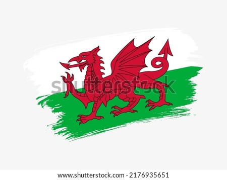 Wales flag made in textured brush stroke. Patriotic country flag on white background