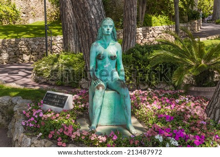 MONACO - JUNE 26, 2013: Photo of sculpture of a naked girl in the gardens of Saint-Martin