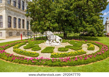 ISTANBUL, TURKEY - JUN 22, 2014: The picturesque bed and sculpture of a lion in the Dolmabahce Palace