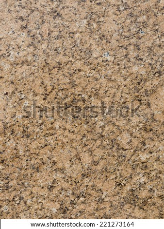large granite slab of brown black beige stone