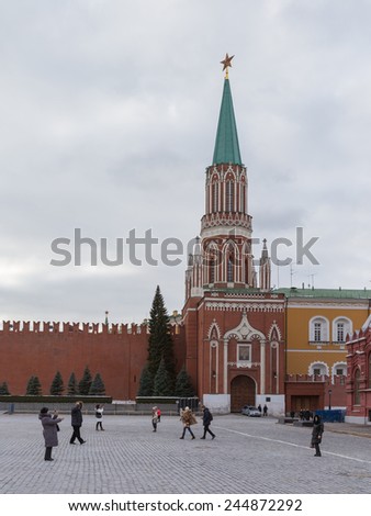 Moscow - January 16, 2015: Red Square View of St. Nicholas Tower of the Kremlin and people do Photos16 January 2015 Red Square, Moscow, Russia
