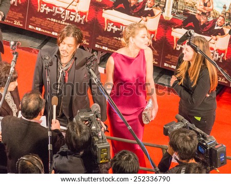 Tokyo - January 27, 2015: Johnny Depp gives interviews and Amber Heard at the presentation of the movie \
